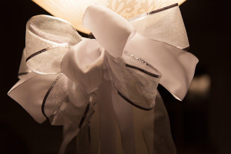 White and silver bow