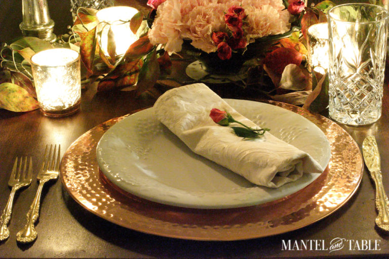 Copper charger, white plate, pink napkin