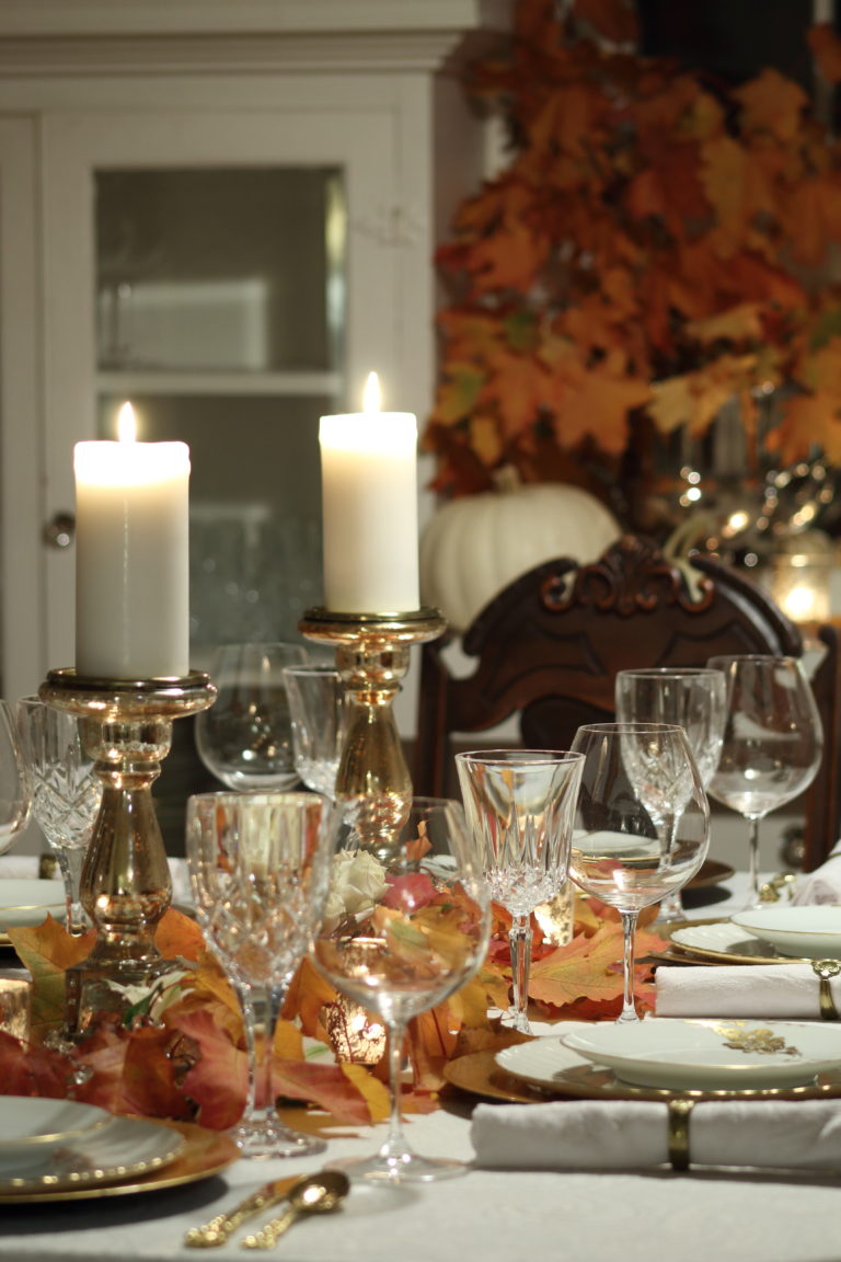 White & gold table with fall leaves