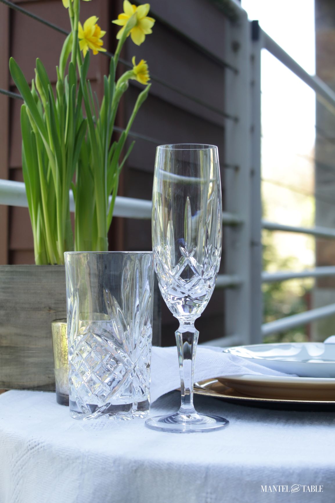 Daffodil tablescape ~ Crystal water and champagne glasses