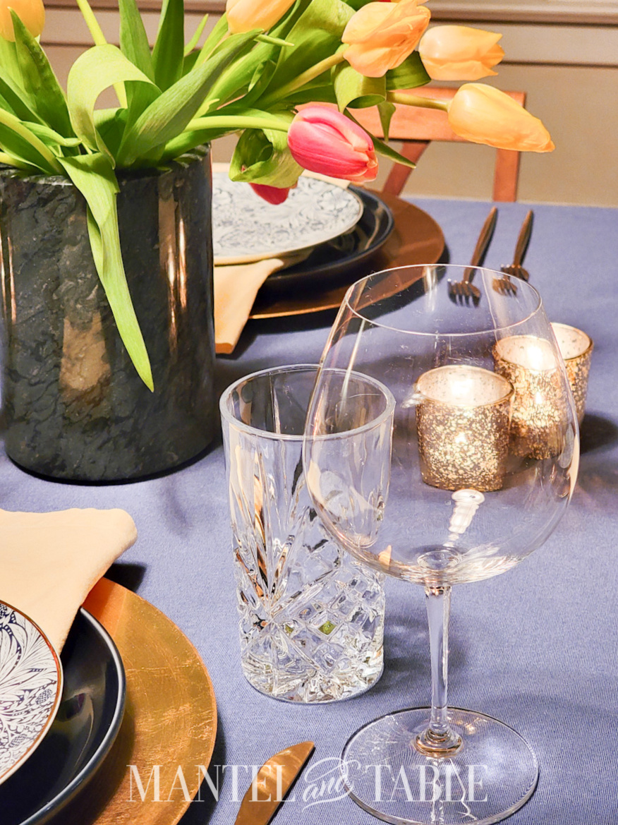 Closeup of wine glass and crystal water glass on a Spring Tulip Tablescape